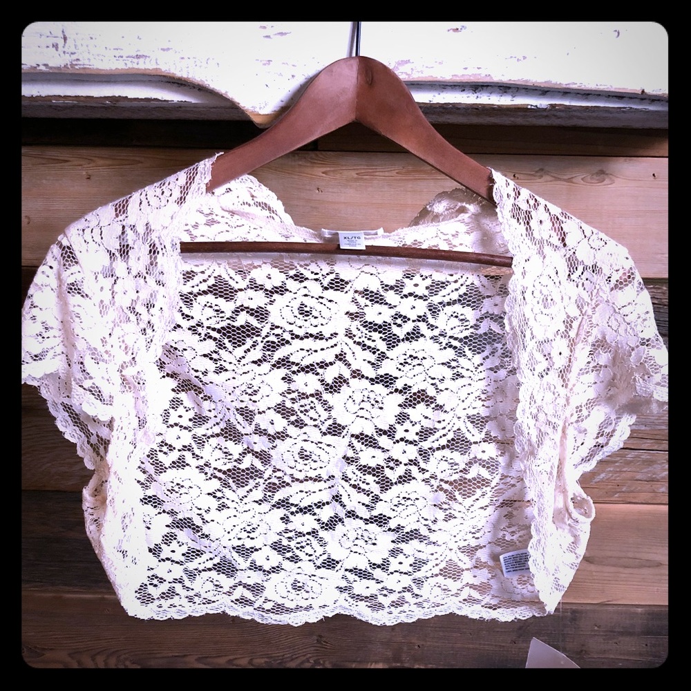 NWT. Cream colored.